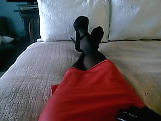 crossdresser in heels and skirt exposes cock for cumshot