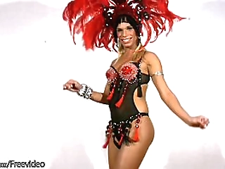 tanned shemale beauty strips off and plays with her shedick