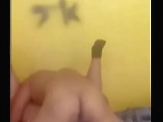 black haired ladyboy is masturbating on couch till cumshot