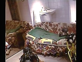 muscular shemale gets naked and urinates