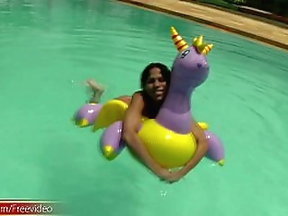 tatooed ebony tgirl plays with good sized shemeat by pool