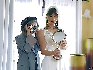 Shemale bride fucks young female photographer right on her wedding day