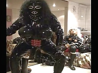 busty brunette shemale wearing high heels gets banged by black twink