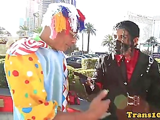 purplehaired tranny riding on clowns dong
